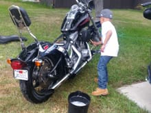 Grandson washing his bike