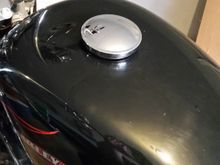 Big obnoxious chrome cap. No thanks...