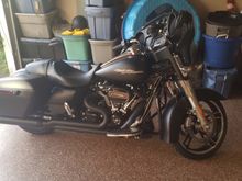 It has lower fairings on it now but i dont have a current picture.  The pipe is very aggressive when you are getting on it but mellows out in 6th at cruising speed.  Now with 500 miles on it is beginning to sound more like my D&D lowcat... which is very good.  The position of the back header pipe proba ly wobt be very comfortable for passengers... no "cute shoes" on this thing.