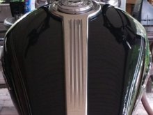 Tank trim w/ Willie G medallion on stock cap. Bye bye...