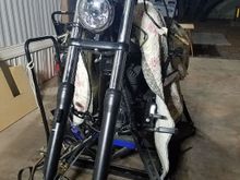 Since i snapped this pic i removed the entire front end. Convertung to WG fxdf trees, adding racetech emulators, new bearings and chases's becaude of the accident, and new bars. Got all my parts just need my sliders and trees bacj from my powder coat guy. 