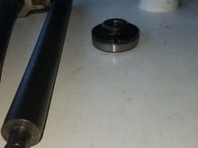 Here is the Jims tool and to the right is how the dies and wedge should be lined up inside the old race or the new race durning removal and install. I highly remomend using this tool. It makes removal 100x easier. 
I also saw a video on youtube where a guy was using what i think was a plasma cutter to cut his old races out. So apperantly you can do that also.