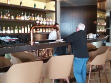Checking out the beer selections at the bar in the front lobby.