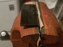 Ued hammer and block of wood to bend bracket.