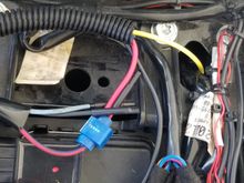 Under seat, the Red wire from power module was connected to the red/blue wire which is an unused fused Accessory 2 power - on all the time.  Black run to ground.  It was difficult to find a clear route for the Yellow down to a Switched Power source, but finally managed to find a path. 