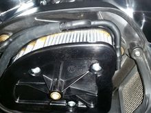 When I ran the stock housing I purchased a couple feet of hose, union and hole plug. ran it out a drilled hole in the bottom of the housing. 