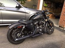 added HD highway pegs. Had them sand blasted to remove the chrome, primed, and painted with John Deere Blitz Black rattlecan