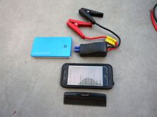 This is my Juno brand lithium battery pack. You can jump start any bike from it along with charging any usb device. It's the size of an iphone.