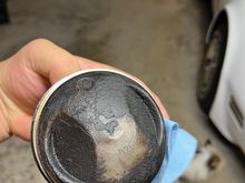 Piston one top side. You can see it marked.020.