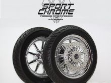 9 Spoke chrome wheels with discs and tires