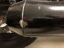 My friend dropped my bike so it has some rash on tailpipe.