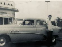 My dad with his 52 Buick Special at a full service gas station. 11/12/ 1953