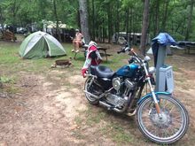 Typical camping spot. From what i saw we were the only tent. Everyone who passed our site checked loved the bike. Look behide my front wheel and see the mud caked onto the bike.