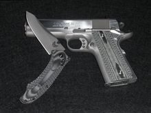 A little custom work from LaRocca Gunworks and a matched G10 Benchmade 950 :)