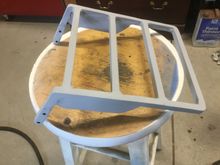 The main frame, from the legs all the way around, and the cross bar on the left are solid 1/2" steel.  The 2 center cross bars are 1/2" steel .060" tubing.  The flat side braces are 1/8"x 1.5" steel flat bar.