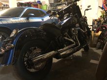 Here is a shot in the garage of the other side of the Anniversary stripped down.  I went with Rineharts on this one. The swing arm bag is a Harley Davidson from the dealership. I was at Destination Daytona yesterday and looked at a few others in JP Cyces but ended up liking the size and shape of the Harley bag the best.