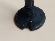 Compare with a burned exhaust valve from a racing engine that had a cracked intake manifold