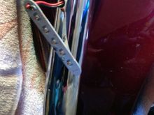 The LED assembly, mounting and wiring holes.