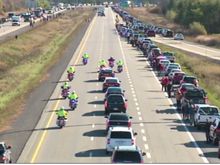 The busiest highway in Canada comes to complete standstill as thousands pay their last respects.