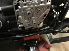 Use loctite (SM specifies red/blue) from here on out. Reinstall the six cam plate bolts using the proper torque spec and sequence. Before installing the cam plate, replace the three o rings I mentioned earlier.