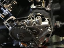 Next remove the timing cover. You will lose oil even if you already drained the oil like I did.