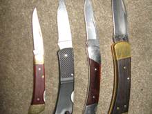 the knife with the black handle is the one i lost. it's a gerber 400 and i like how light it is. i had it for a long time and i just wanted to see if i could find it. i made a small sheath that will only work with that knife so the sheath was useless without the knife. 