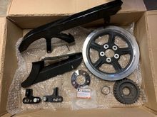What's left: I found most of this fits '00 and up:

1-3" lowering brackets - '00 - '15, $15!
Belt guards: top fits '04 up, bottom '04 - '13, $40
Sprockets - '00 up I think, both for $50 with spacer and nut.  Will separate.