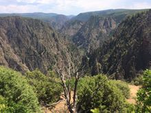 There is a road that drops 2,000 feet in two miles to the bottom of the canyon. It was more fun riding back up.