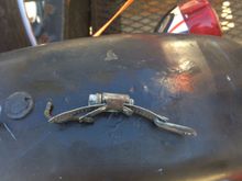 Homemade strap holding the tank