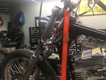 Here you can make out the hi/lo beam switch mounted to the frame just below the blue wire