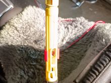 Old cable. Note much smaller adjustment spring. Also note I installed the lower installation red clip from the new cable. This keeps the connector from pulling out (when the adjustment clip is out / not engaged).