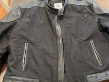 This jacket is in absolute brand new condition