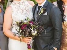 Chief designer is one in the suit. 