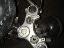I have a 2002 Sportster 883 and was wondering if anyone could give me the torque spec on this big bolt in the center pictured here? Thanks in advance!