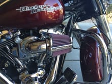 HD Screaming Eagle Heavy Breather Elite.  Punched out crimped rear baffle with 3/4" sharpened steel stake.  Amazing sound for FREE.  Home Depot baby.  Stock mufflers look just fine.