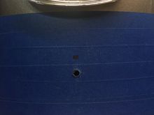 first hole in the small mark above was a smaller hole for the led frame light wires.