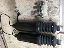 Air shocks have a lot of miles and the rubber is torn. But no leaks and they worked like new when I took them off to get Progressives. $75.00  or any decent offer.