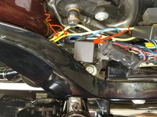 1.  Relay under seat tucked down under side rail just above where horn is installed below.  2.  Ran the two yellow wires from stock horn to relay as required in the wiring diagram from Wolo.  Ran them in a black flex tube under the gas tank.  

