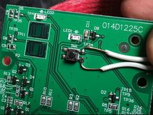 This might look exactly like yours, use a meter to find the two pins that are "open" and close when button is pushed. solder wires on those two.