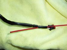 This is the left side switch wires. It's not shown here but i taped the wire and plug completely. These pulled through very easily.