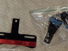 OEM black stand up plate frame and hardware.