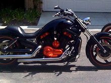 2005 V-Rod Painted Engine Covers, 240 rear wheel, air ride, custom fenders, bars, seat, wheels, and Tank cover!