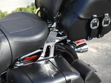 Luggage rack lowered 3-7/8". Added bolts heads give this mod away