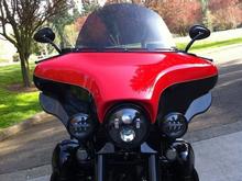 Front view.  Camera lens is exactly level with top of fairing, so you can see that the bars are just barely visible.  Amazingly, my hands were out of the wind at all speeds.