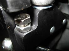 After mounting front TT bracket, set gap at 'stop' nut at 3/8."