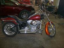 Custom front fender installed and painted Kandy Tangerine.