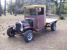 1925 T built it in the 70's in CA found cab in Lovelock NE
292 6X2's 4sp 12 bolt 3.36
Been Sitting 15 years Christmas Brake 2008 i got it out redid brakes clutch (original problem)re wired built carbs tires