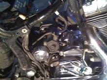 had to take the god damn oil tank off to take two damn bolts out for the starter.  i remembered why i dont like working on bikes