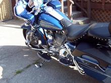 Cromed flamed saddle bag latch covers, flamed floor boards, flamed highway pegs, flamed shifting linkage, flamed kick stand, and flamed horn cover.