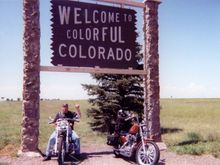 Trip to Colorado in 2003.  I am actually pointing up to the sign not giving the middle finger :)